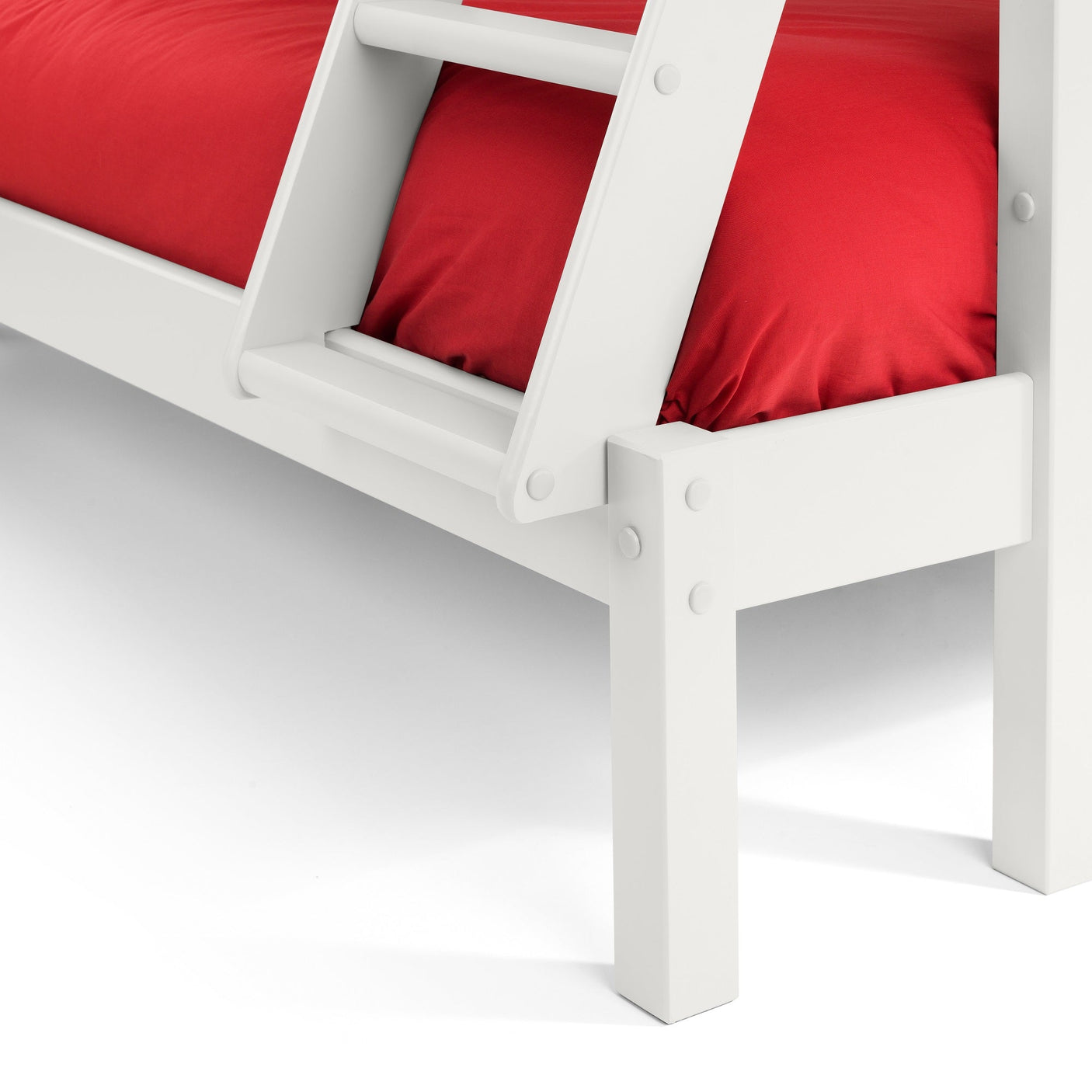 White wooden triple sleeper bed ladder detail with red bedding