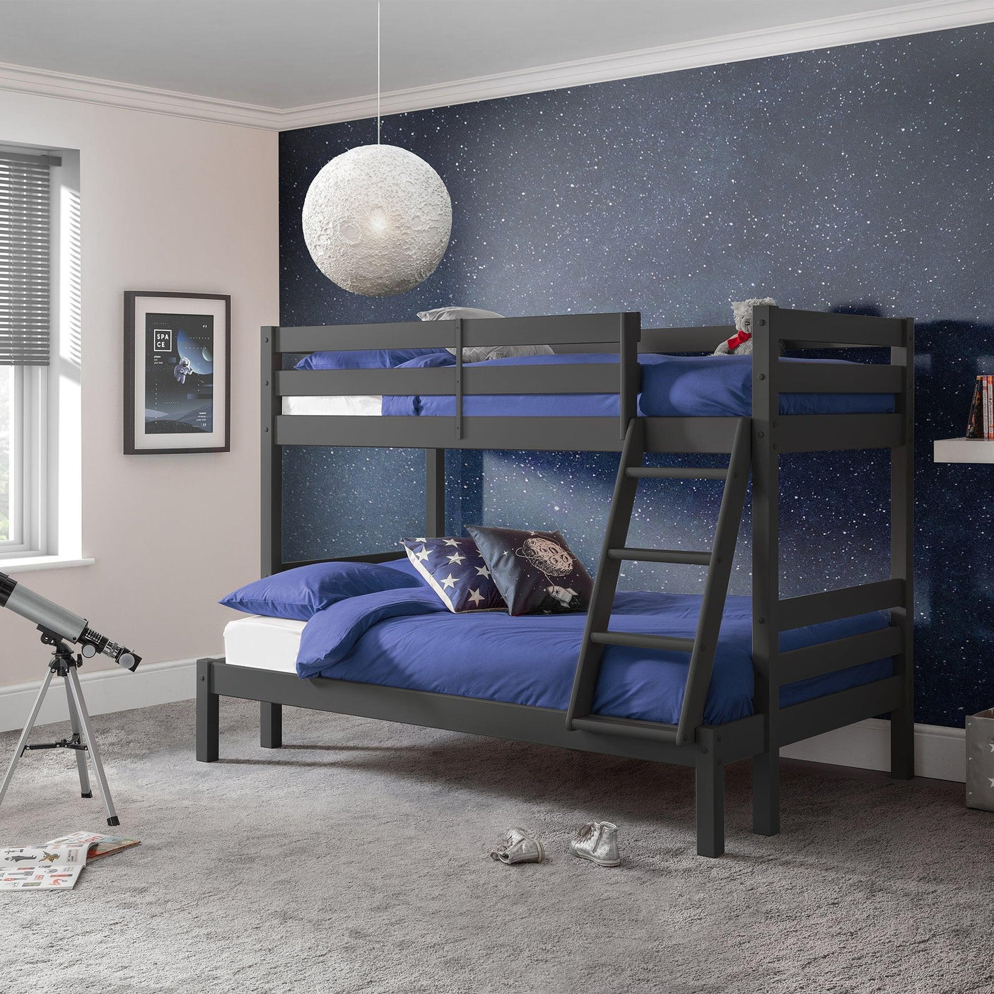 Anthracite triple sleeper bunk bed with blue bedding in space-themed kids bedroom