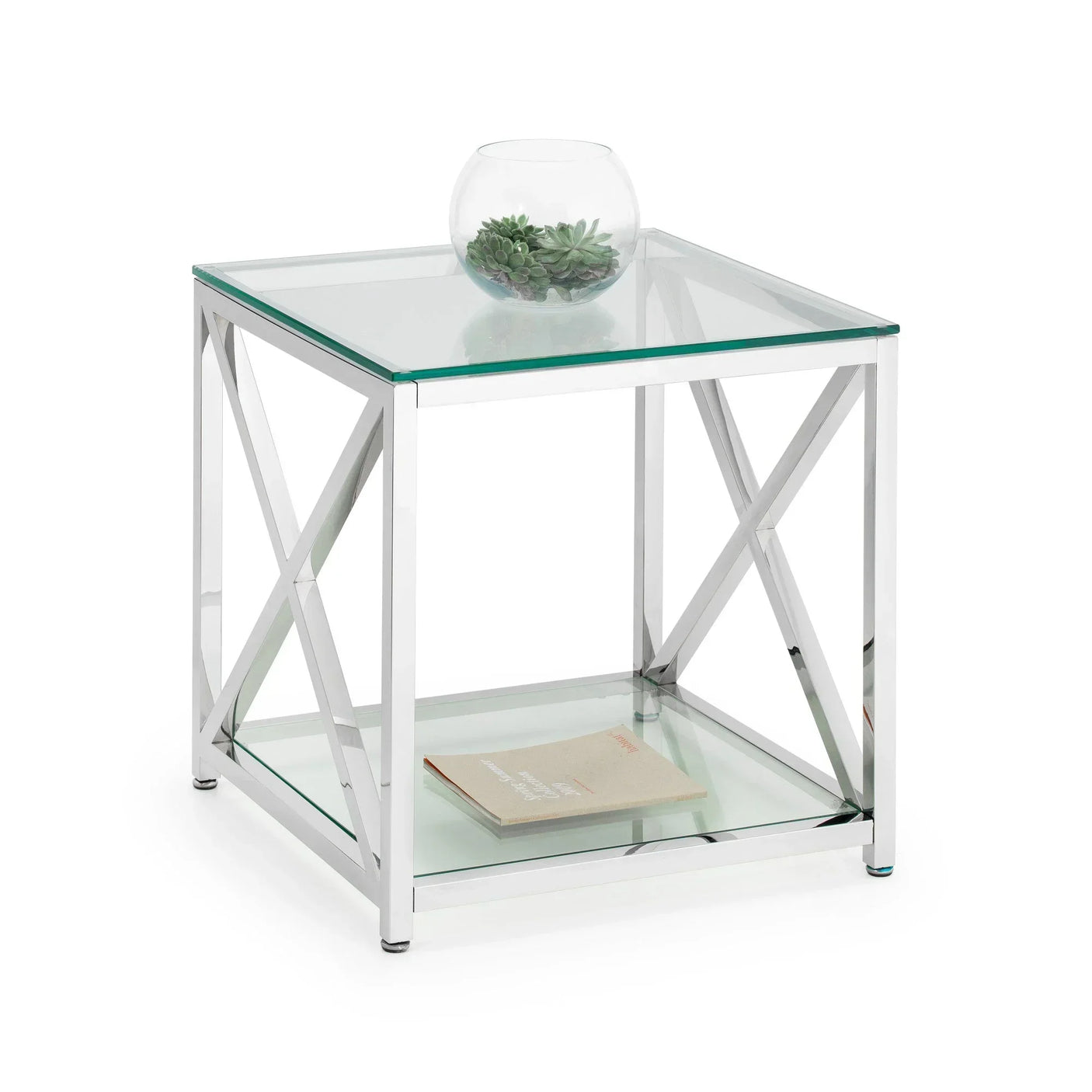 Glass and chrome side table with lower shelf, bowl vase and book displayed