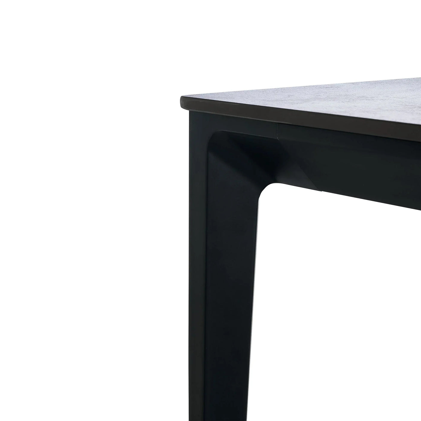 Rectangular stone top dining table with black metal corner and leg detail