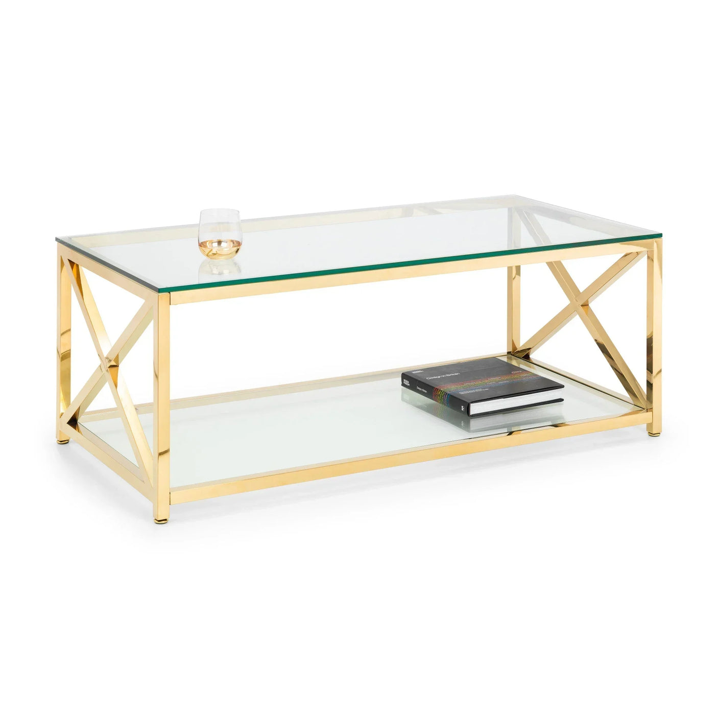 Glass coffee table with gold metal frame, lower shelf holding books, glass tumbler on top