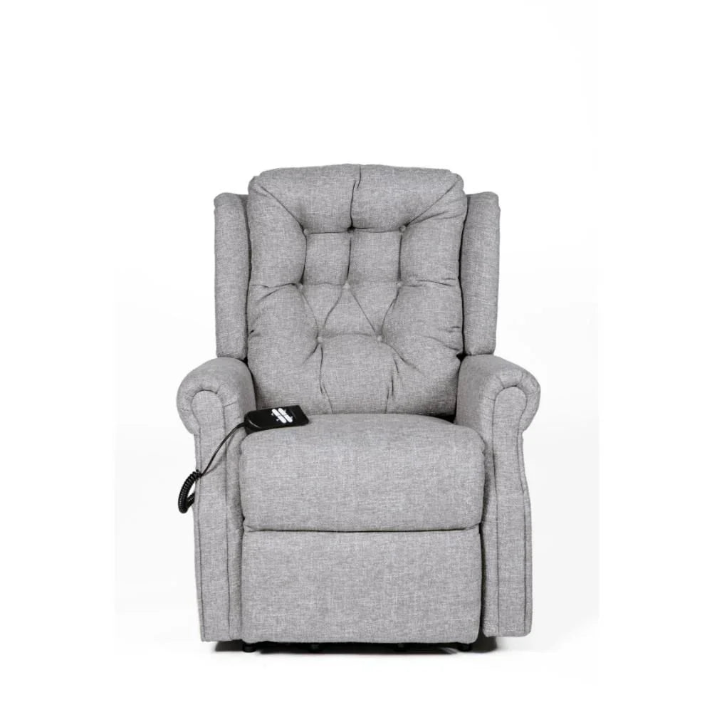 Grey fabric recliner armchair with button-tufted backrest and remote control on left arm