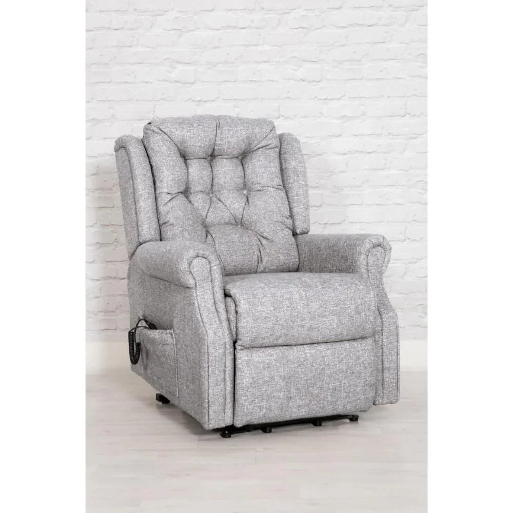 Grey fabric recliner chair with button-tufted backrest and side pocket on light wood floor