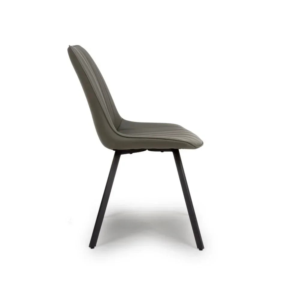 Grey dining chair with metal legs side view against white background