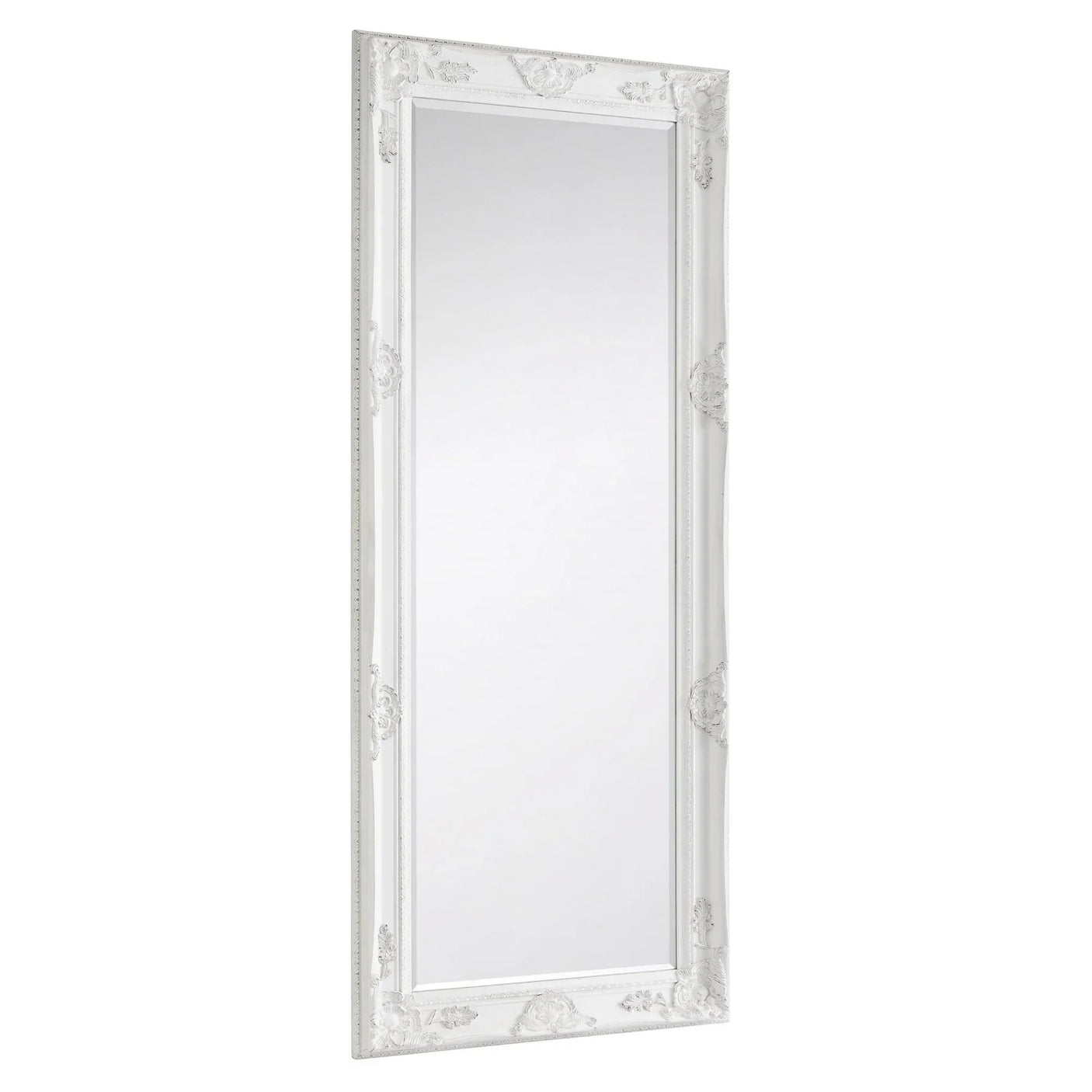 White ornate dress mirror with decorative carved frame, shown at an angled side view