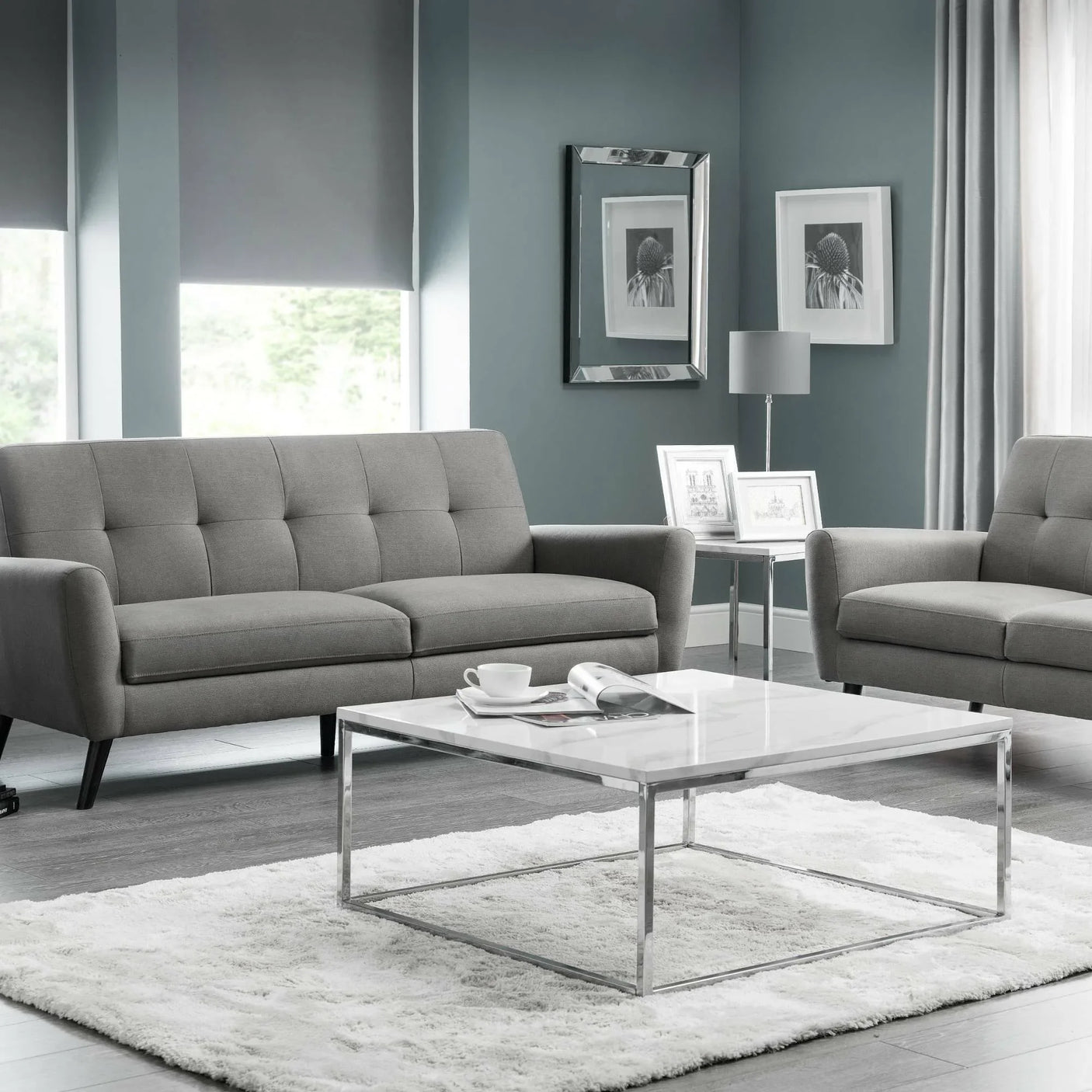 Grey fabric sofa set with metal frame coffee table in contemporary living room setting