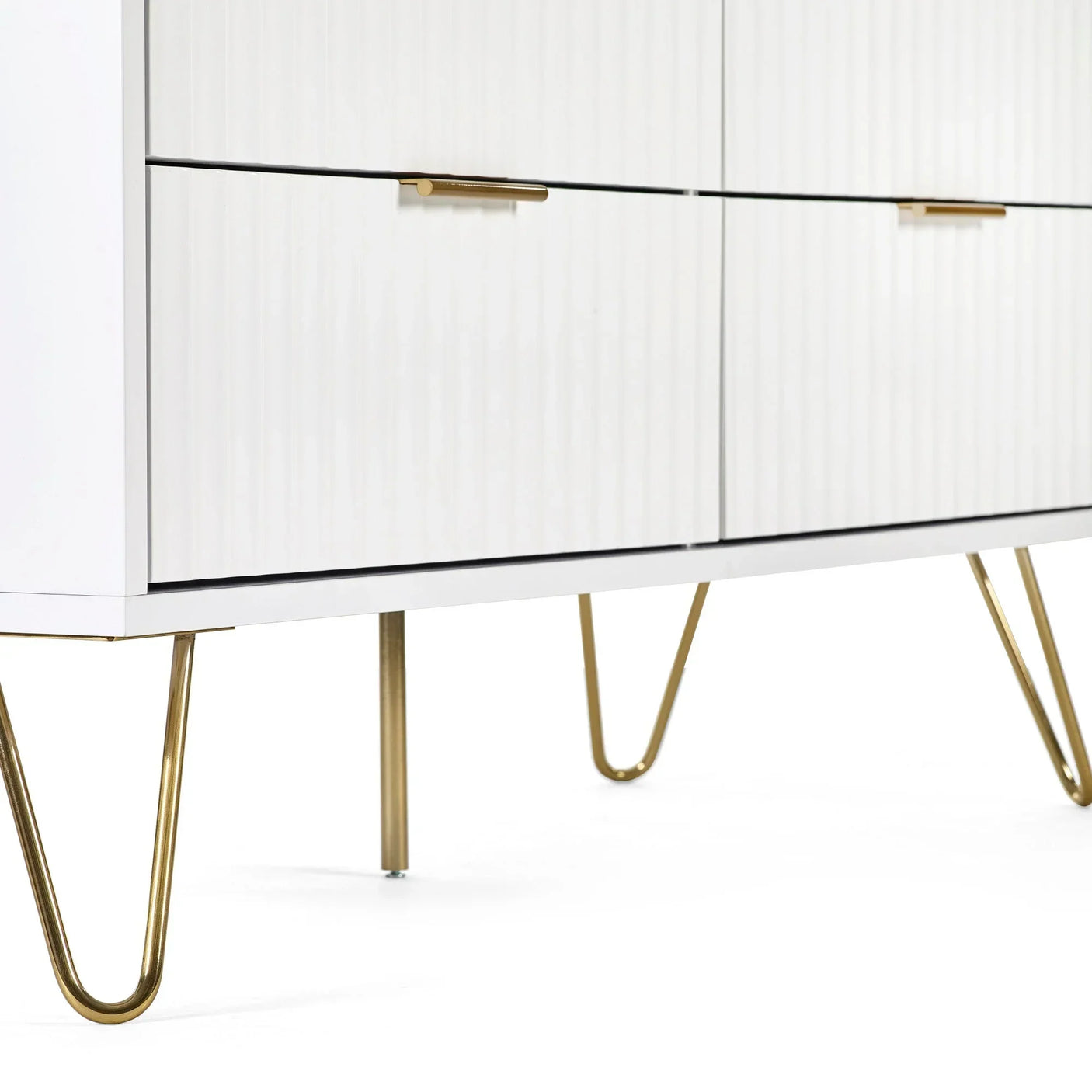 White sideboard cabinet with gold metal legs and horizontal handles close-up