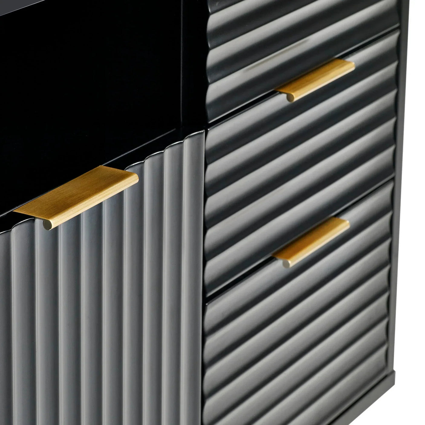 Modern sideboard with ribbed grey metal drawers and gold handles, close-up view