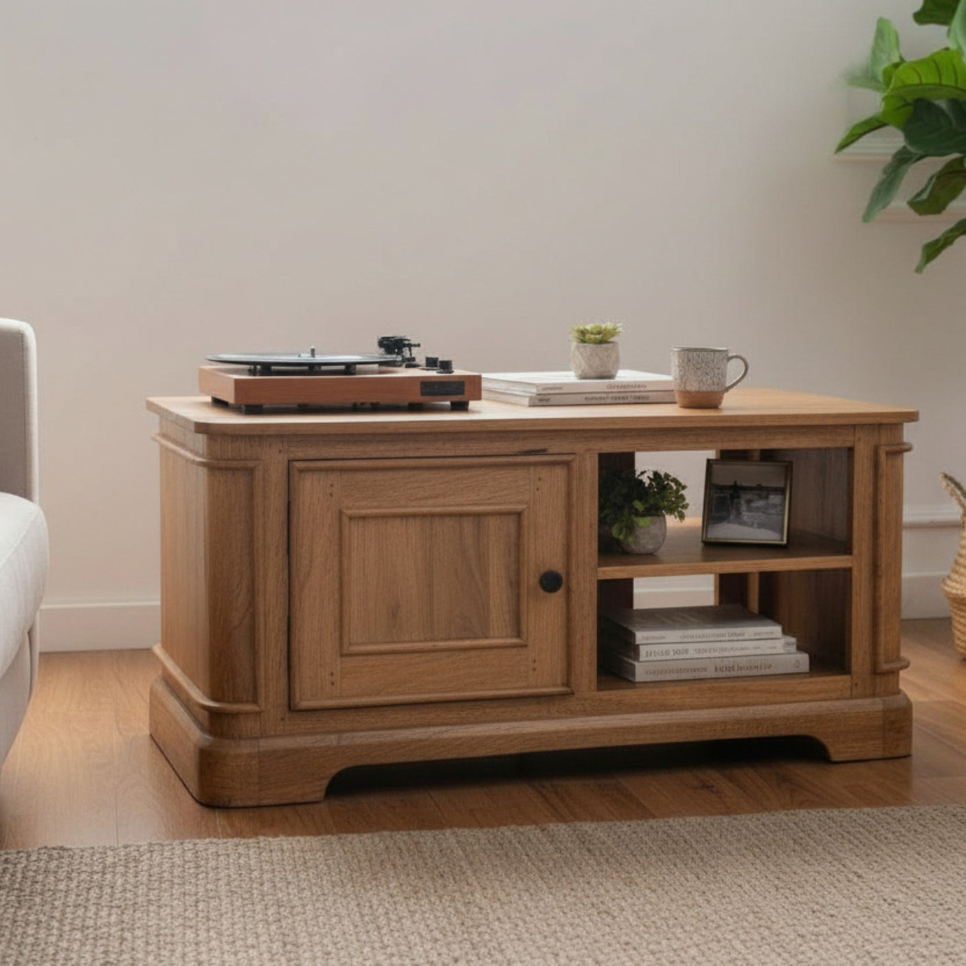 Wooden TV stand with decorative items in a living room setting