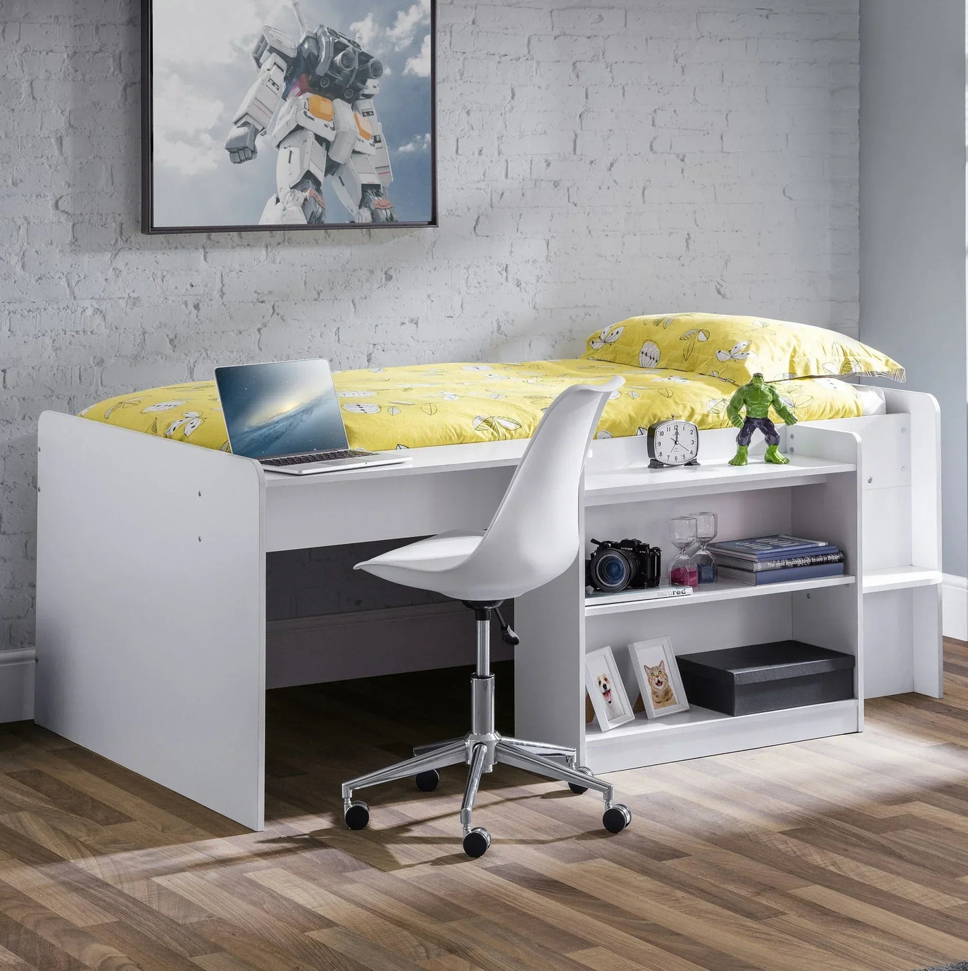 White midsleeper bed with desk, shelves, and chair in a modern bedroom with wood flooring