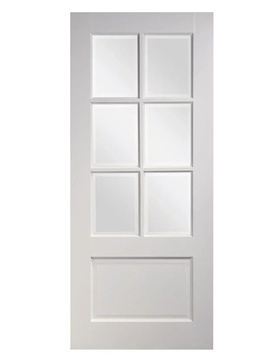White panel interior door with six glass panes and solid lower panel