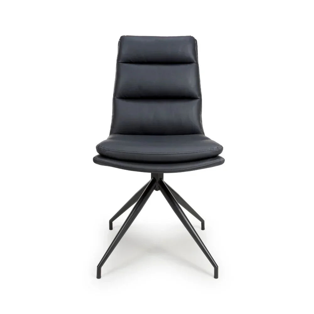 Black leather dining chair with padded seat and metal swivel legs, front view