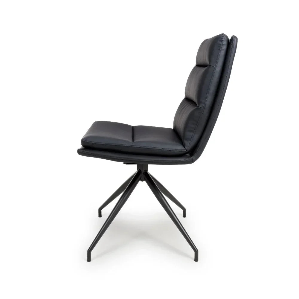 Black leather dining chair with padded seat and metal legs, side profile view