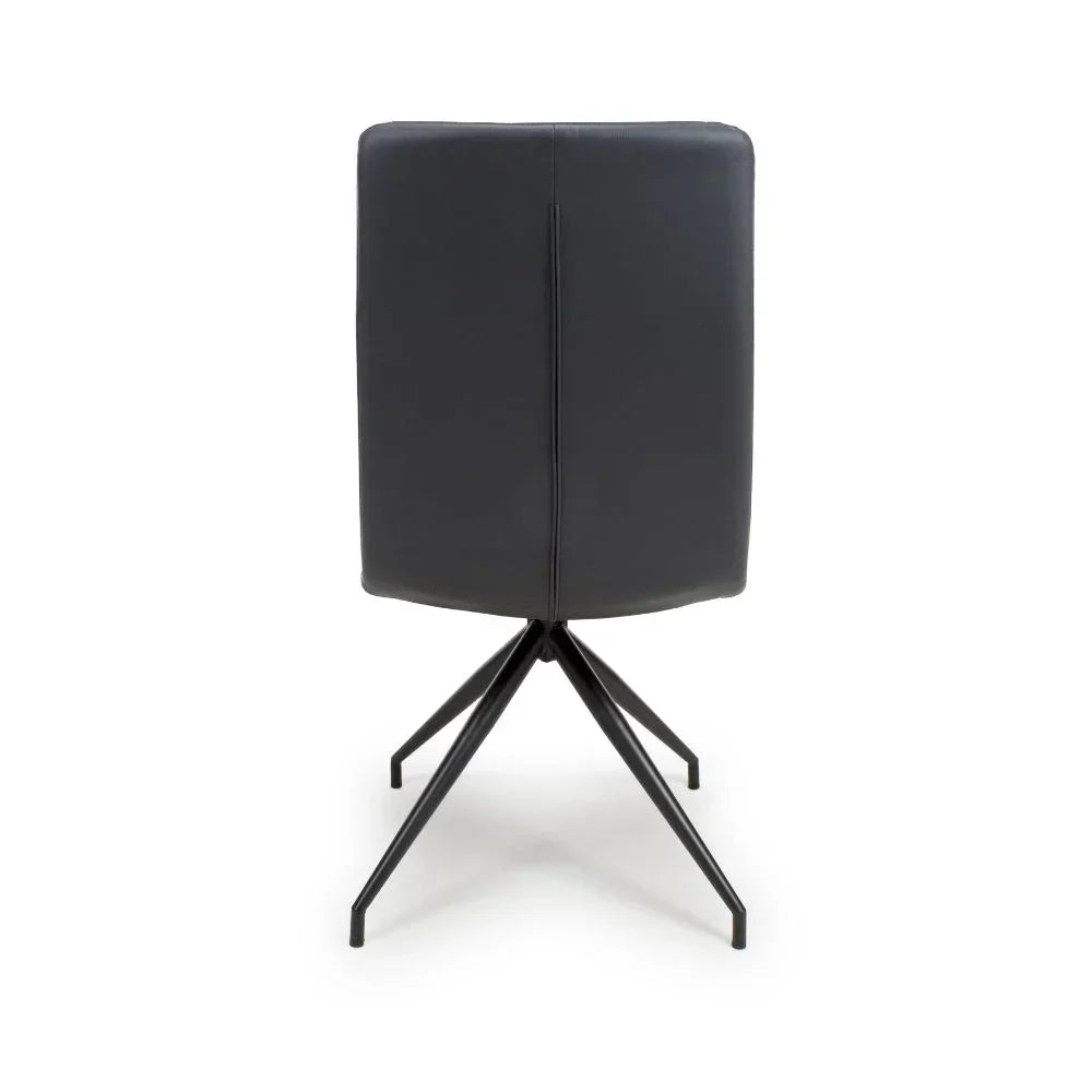 Black dining chair rear view with metal legs and sleek upholstered backrest