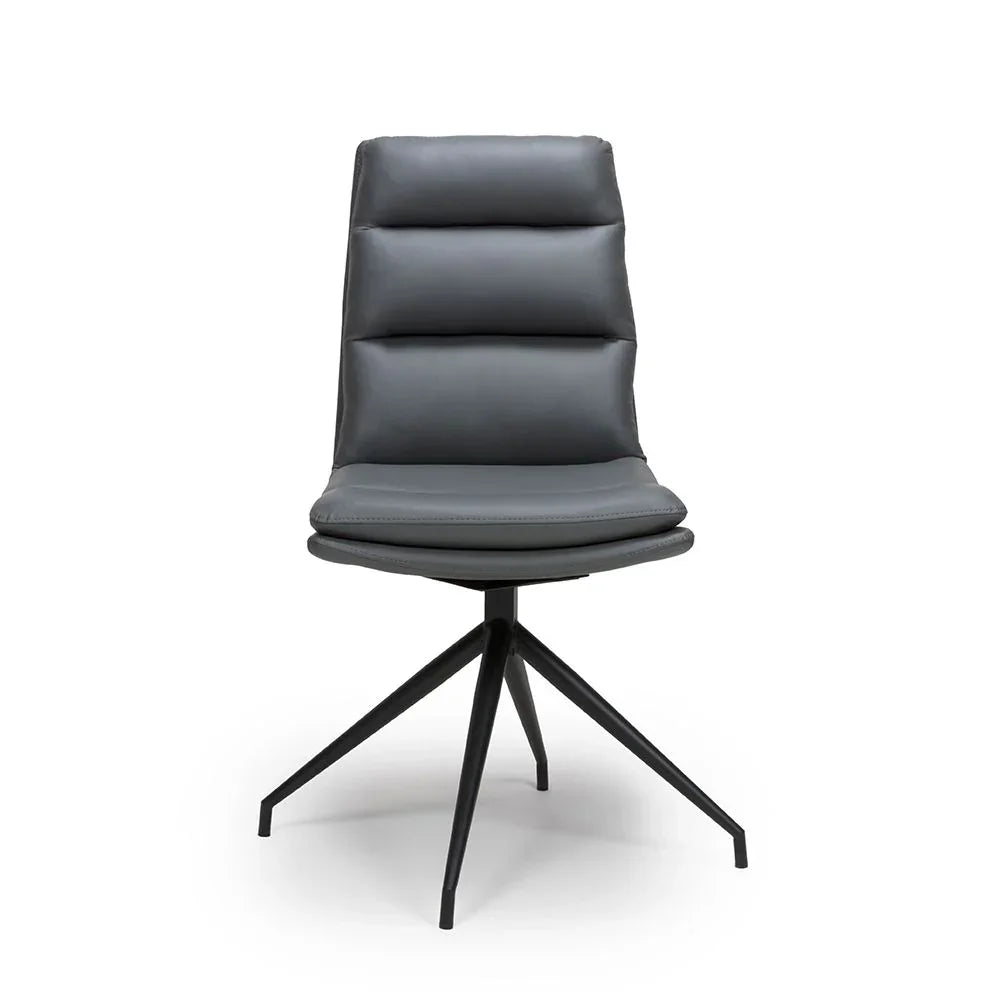 Grey leather dining chair with padded seat and black metal legs on white background