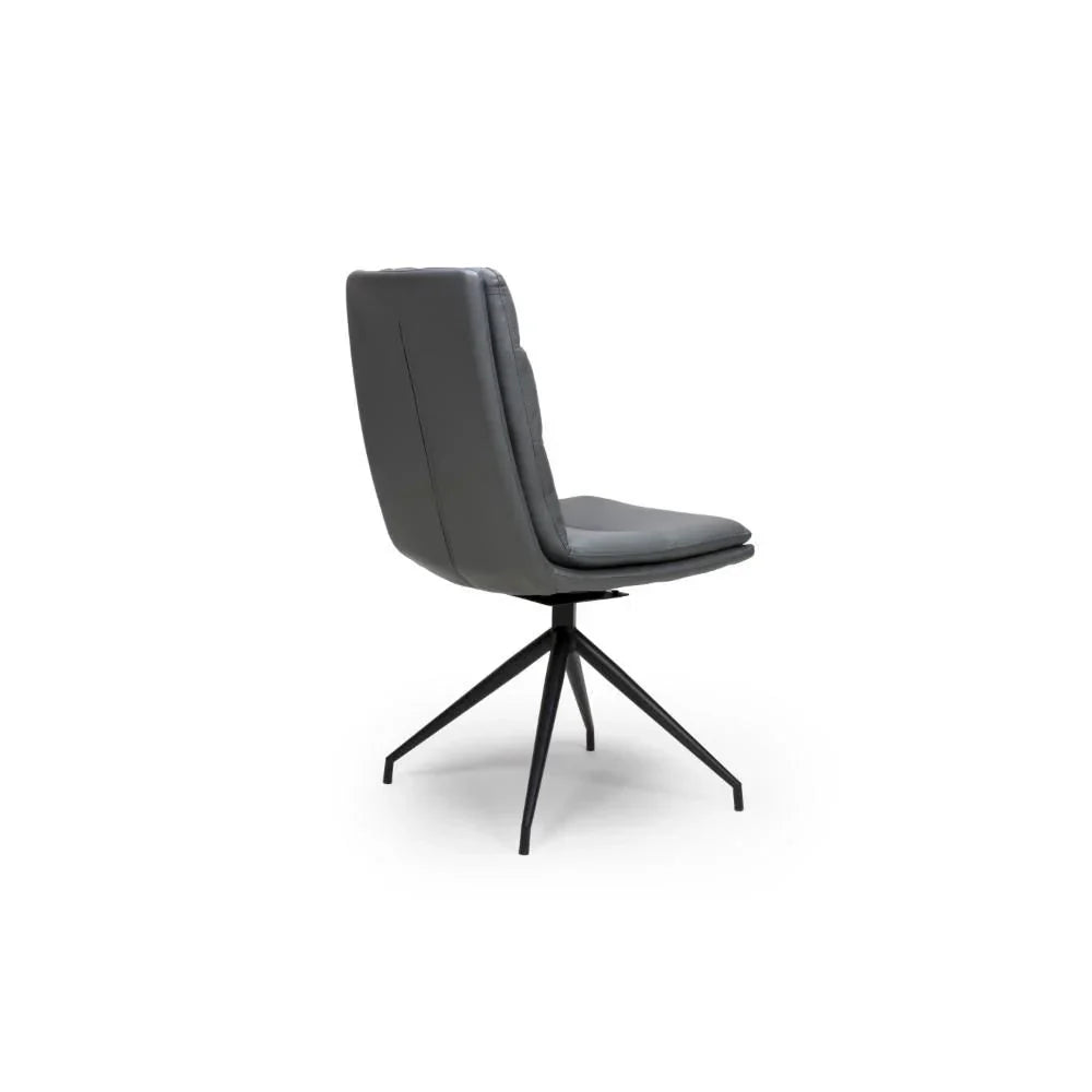 Grey swivel dining chair with padded seat, high back, and black metal legs side angle