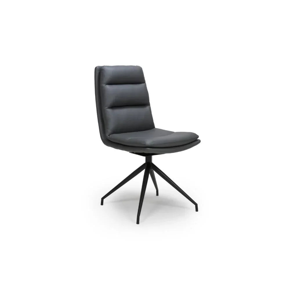 Grey swivel dining chair with padded seat and black metal legs, side angle view