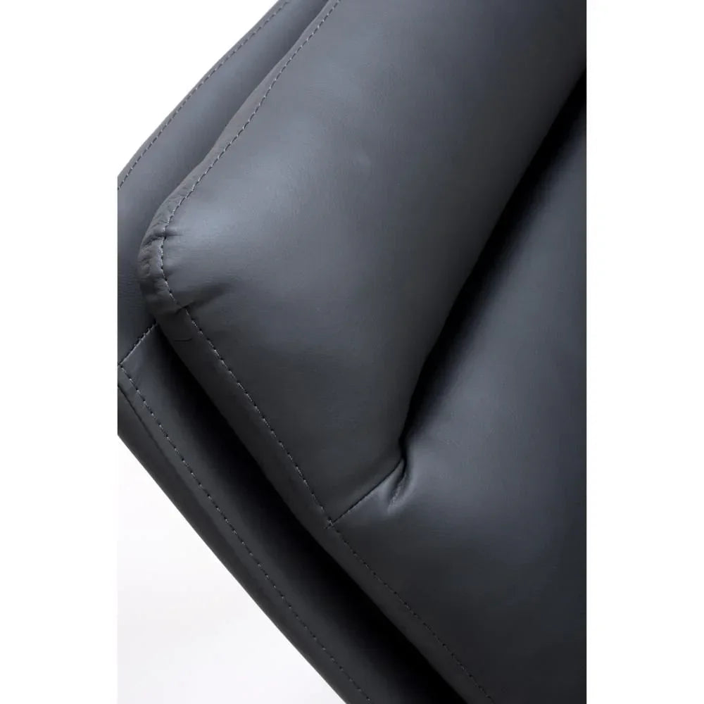 Close-up of grey leather sofa cushion with visible stitching detail