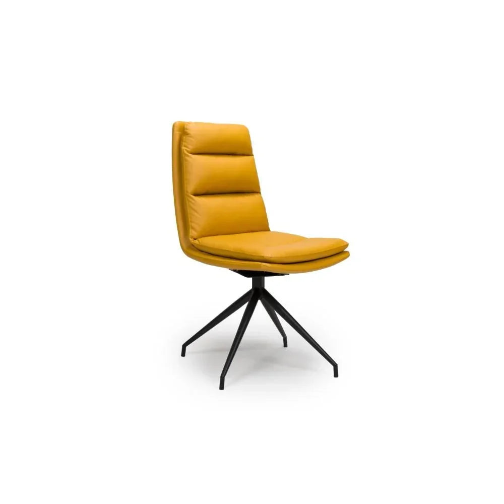 Mustard yellow dining chair with padded seat and black metal legs, angled side view
