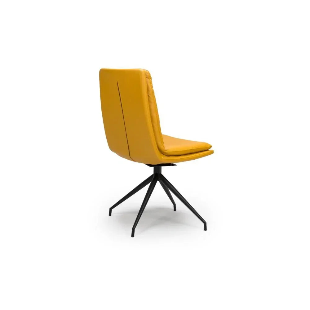 Mustard yellow dining chair with black metal legs, angled back view on white background