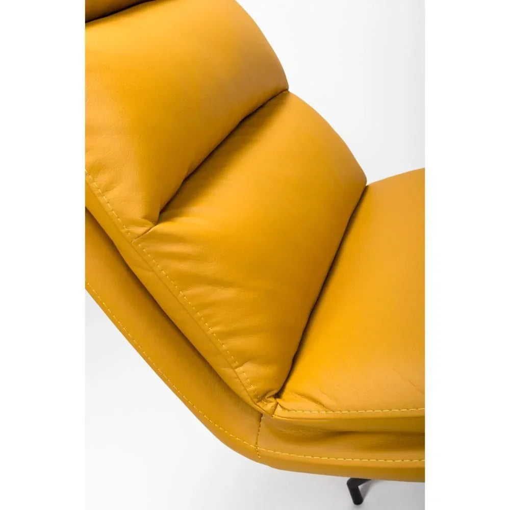 Mustard yellow leather chair seat with padded cushion detail, close-up angle