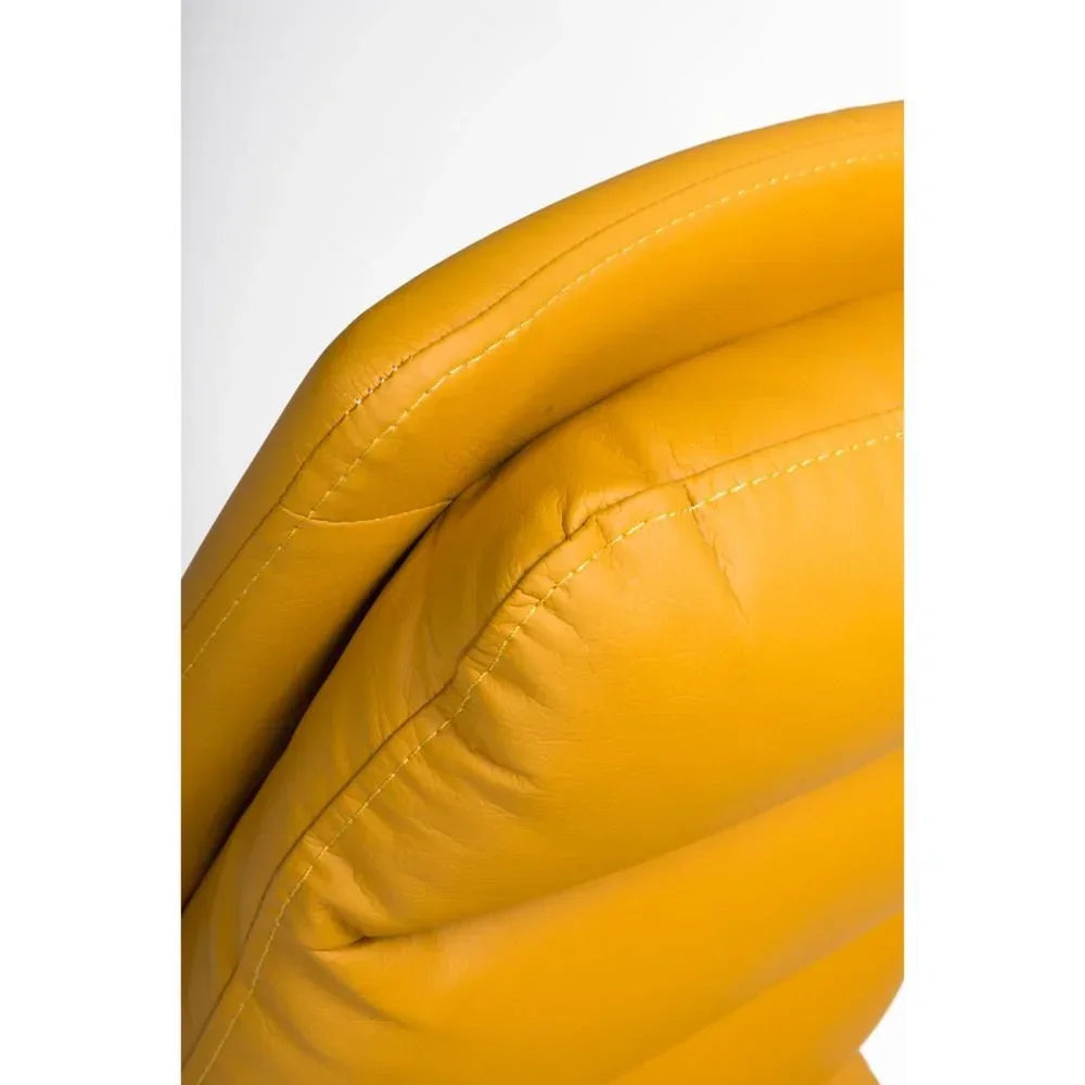 Close-up of yellow leather chair backrest with visible stitching detail
