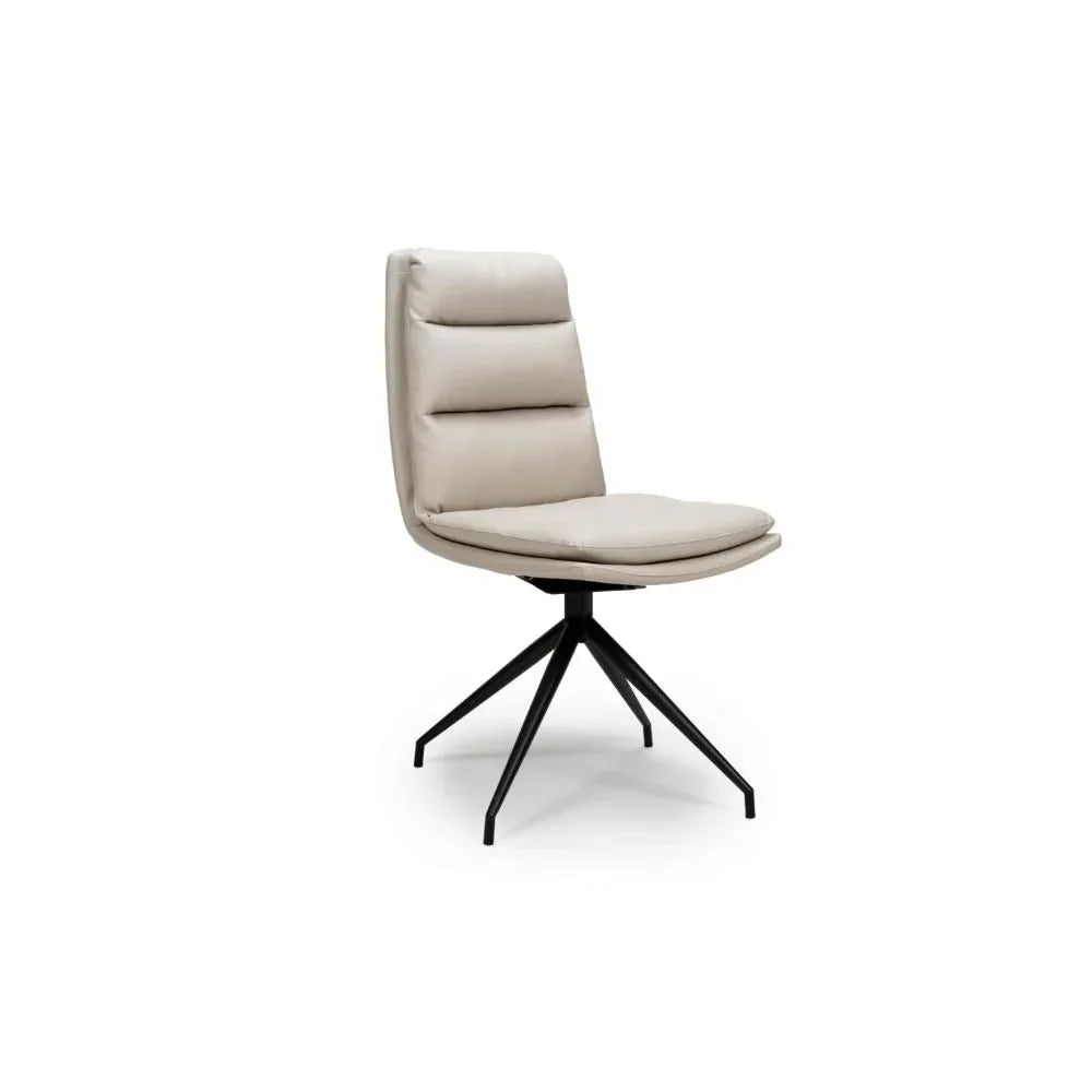Beige upholstered dining chair with padded backrest and black metal swivel legs