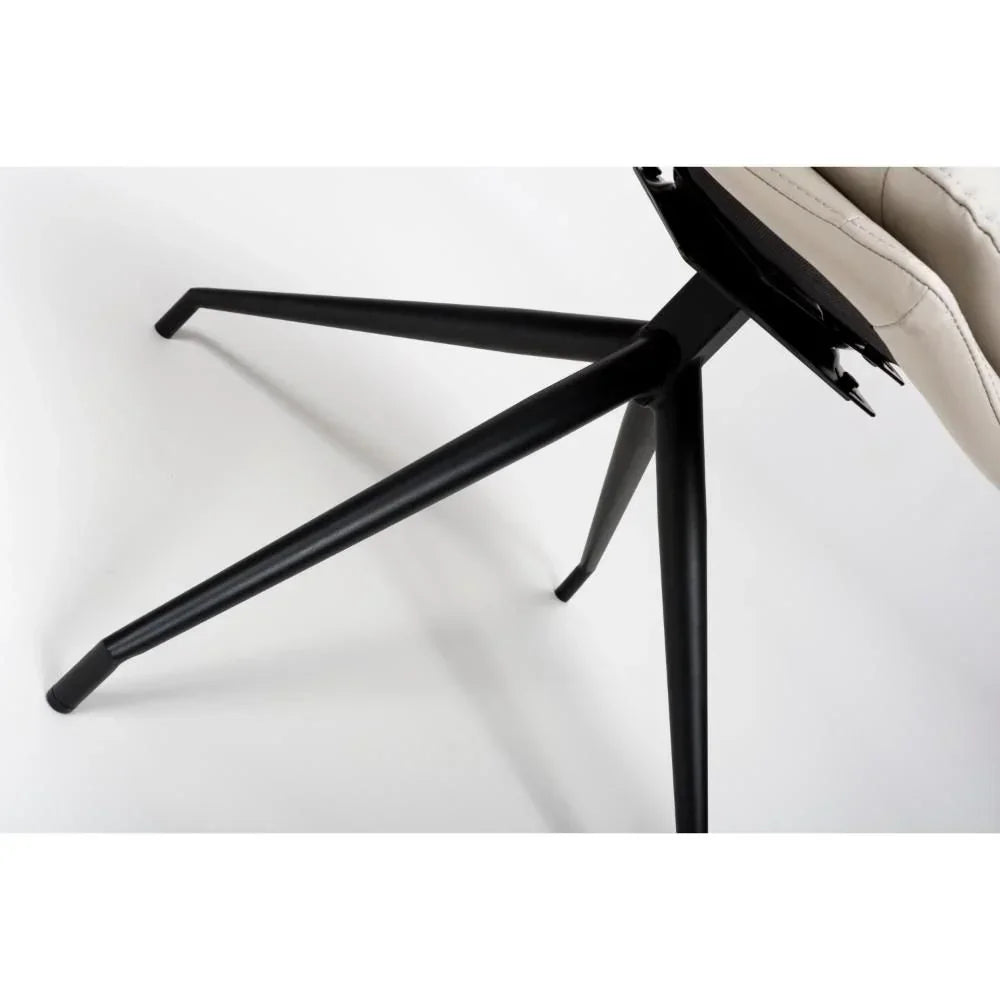 Black metal chair frame with four angled legs and cream upholstered seat corner view