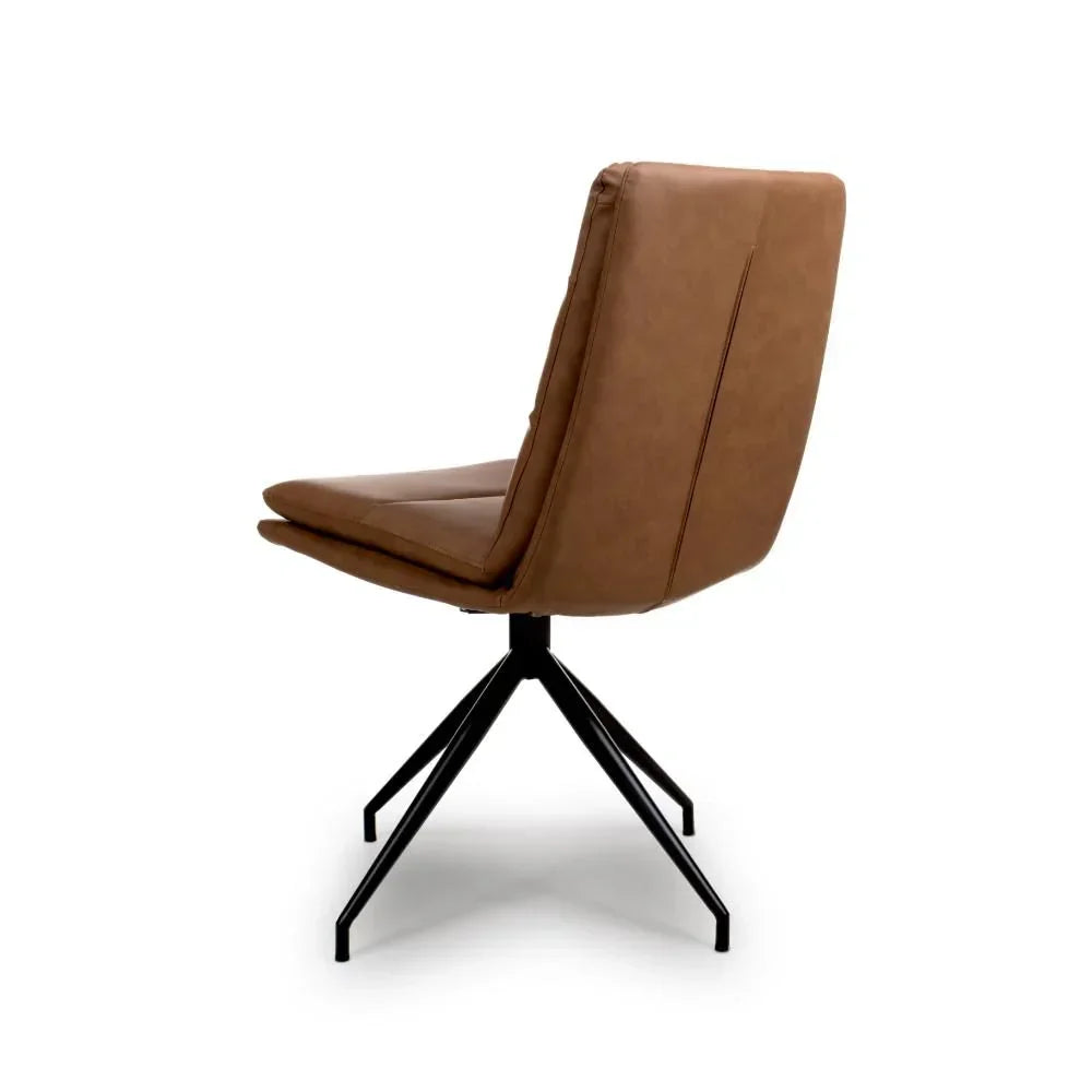 Brown leather dining chair with padded seat and black metal legs, side angle view