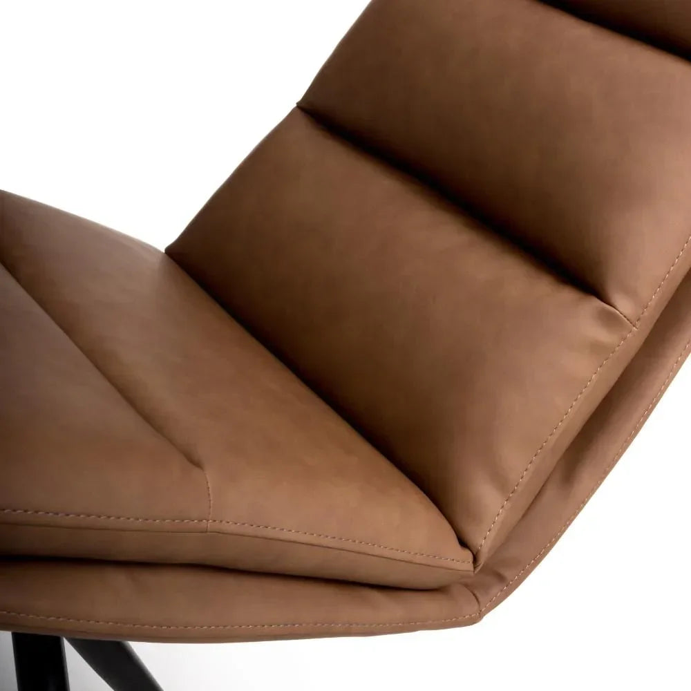 Close up of tan faux leather dining chair seat with padded horizontal panels