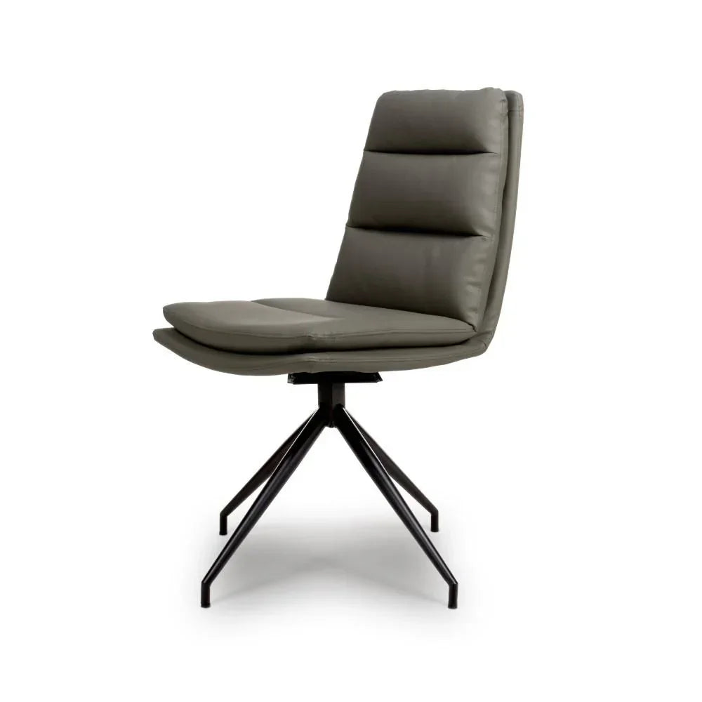 Grey leather dining chair with black metal legs and padded seat, side profile view