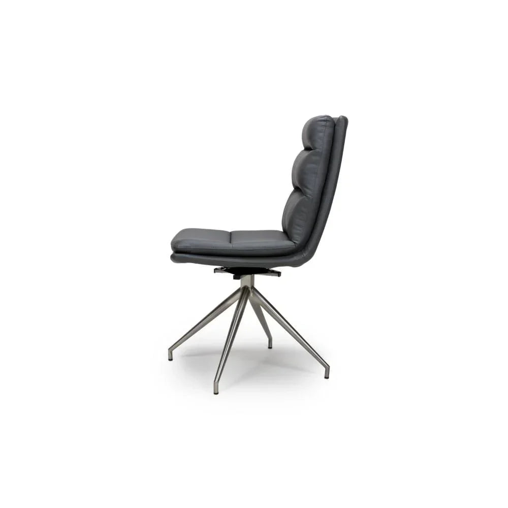 Grey dining chair with padded seat, high back, and brushed metal swivel base, side view