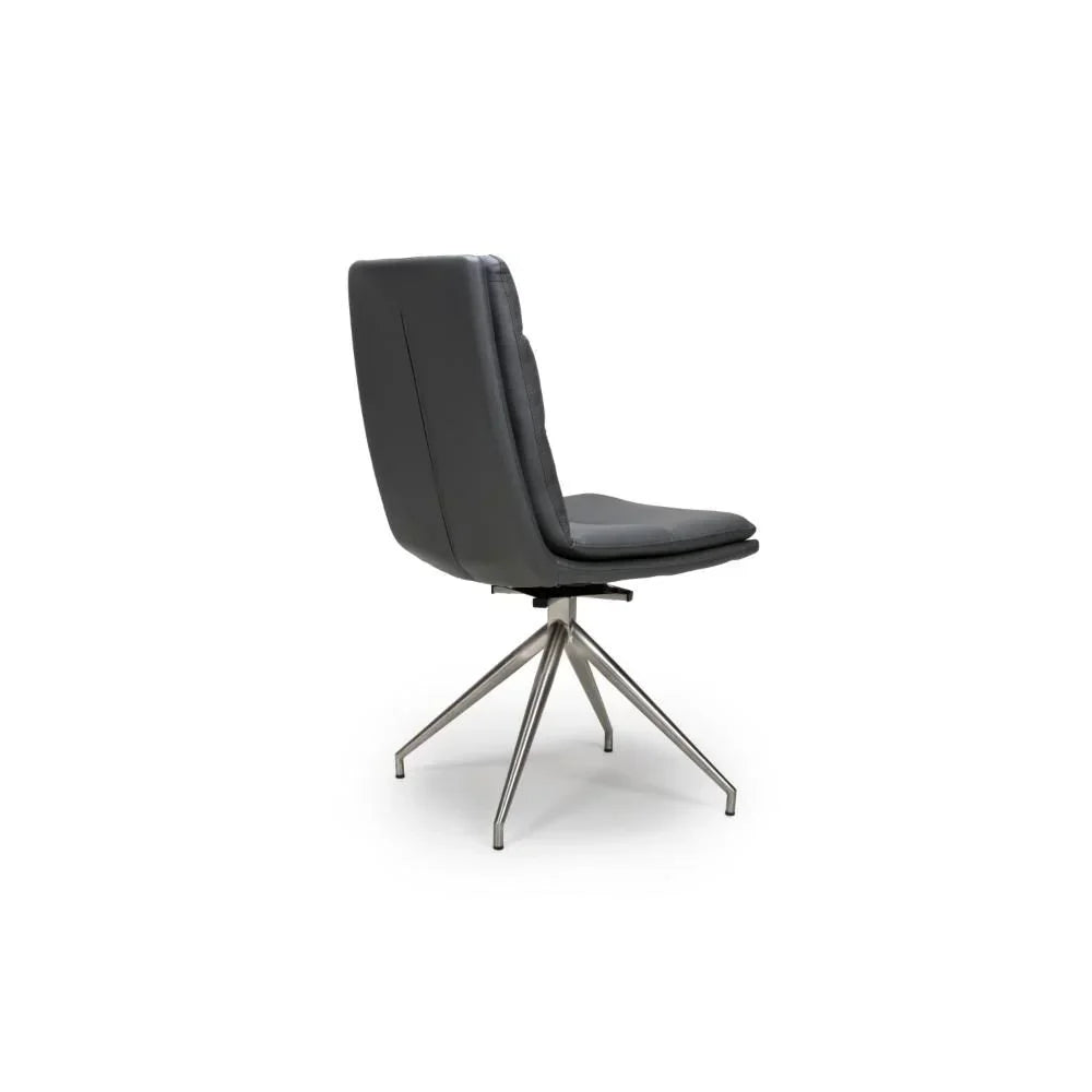 Grey dining chair with padded backrest and metal swivel base, rear angle view