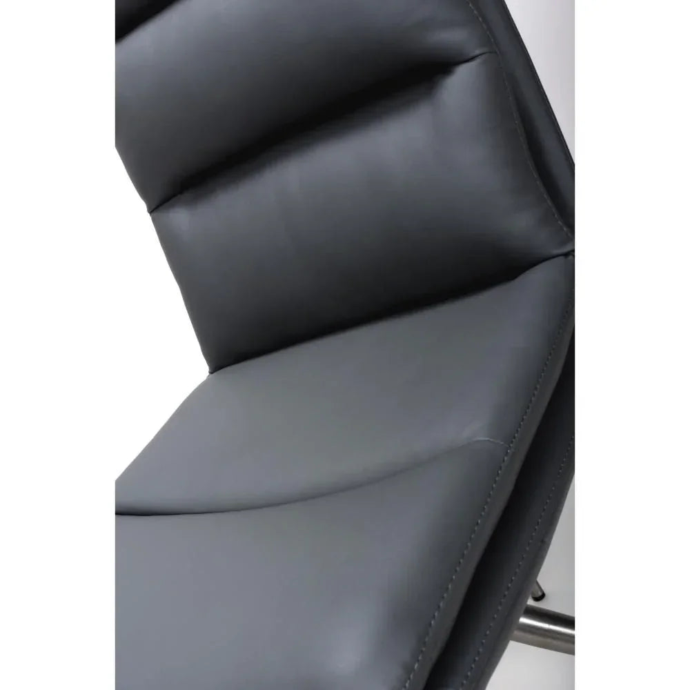 Close-up of grey faux leather dining chair seat with chrome legs