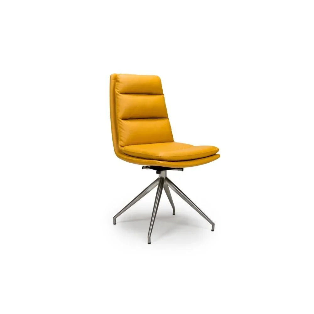 Mustard yellow dining chair with padded seat and metal spider leg base, side angle view