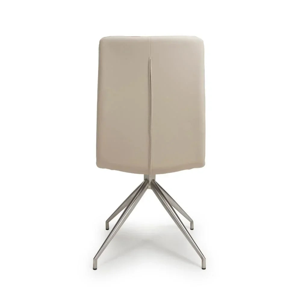 Beige dining chair with metal legs shown from the back on a white background
