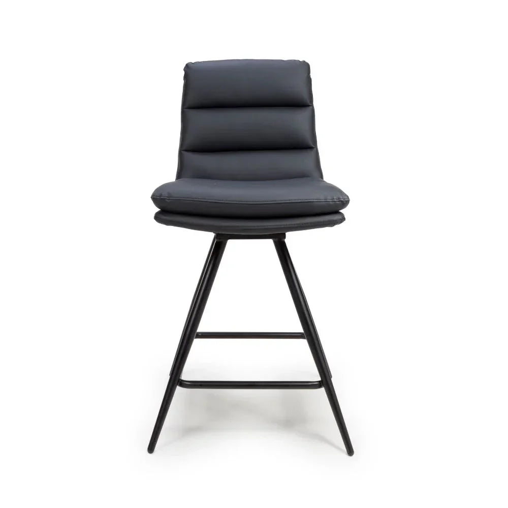 Black faux leather bar stool with padded seat and black metal legs, front view