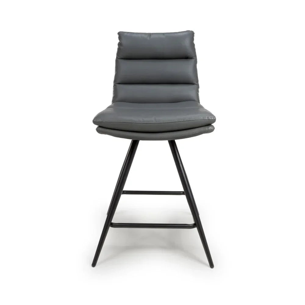 Grey bar stool with padded seat and metal legs, front view