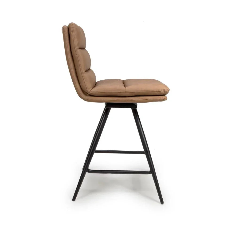 Brown bar stool with padded seat and backrest, black metal legs, side profile view