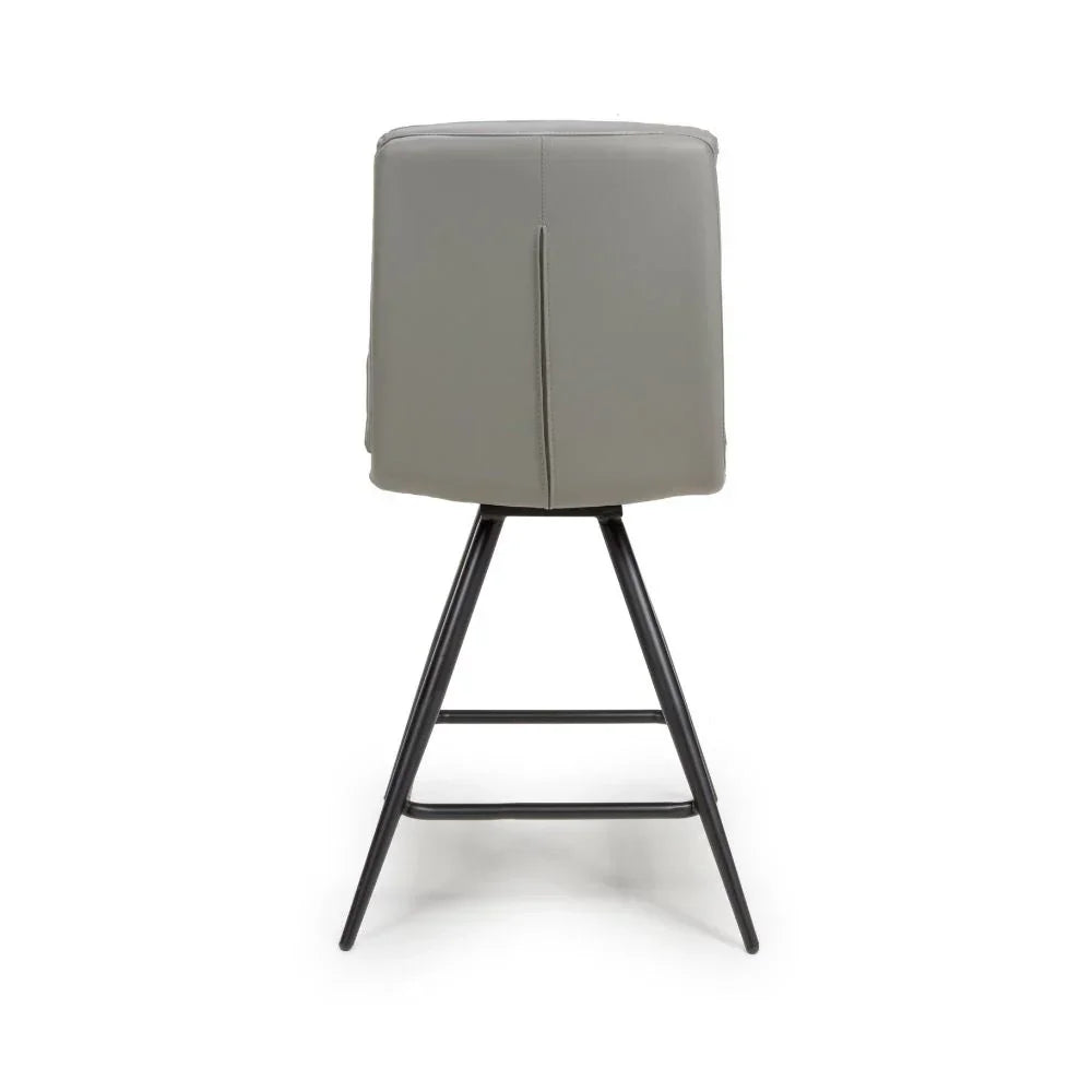 Grey leather bar stool rear view with black metal legs and simple stitching