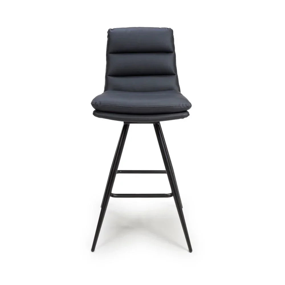 Black padded bar stool with metal legs and horizontal stitching, front view
