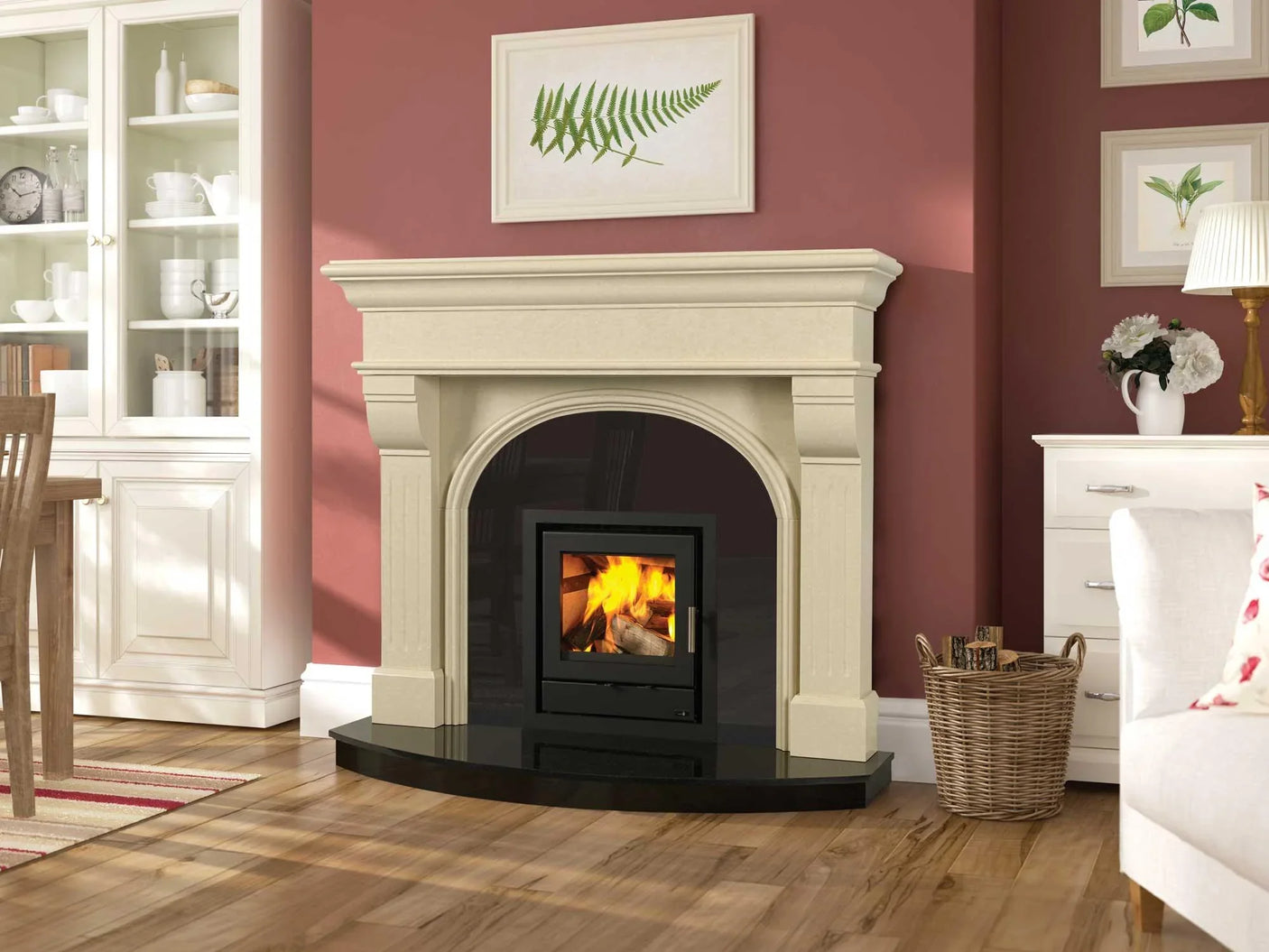 Ivory marble fireplace surround with black hearth and inset wood burning stove in living room