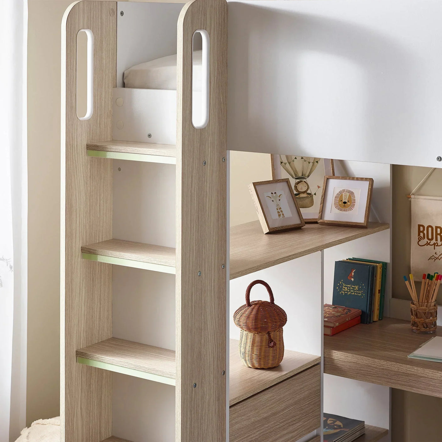 pale wood high sleeper bed ladder with desk shelving and decor items