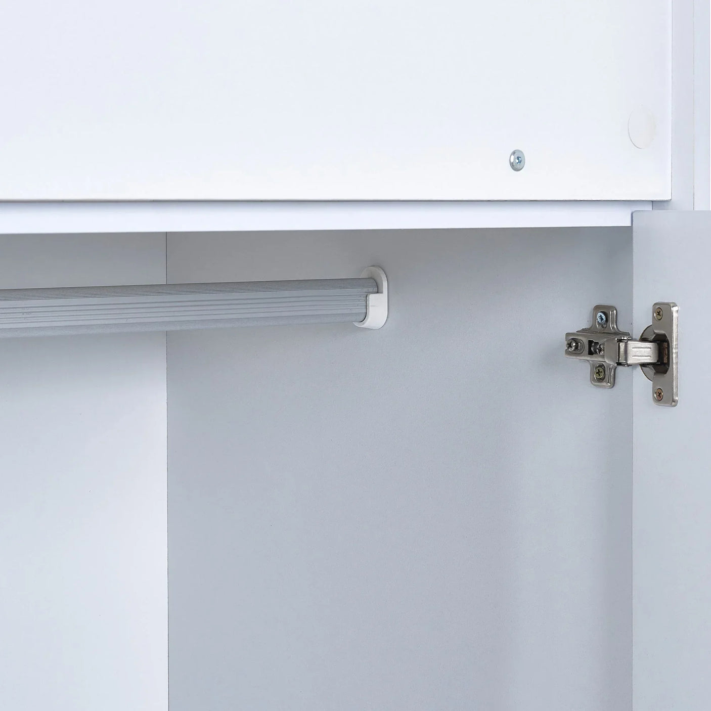 Pale wood and white wardrobe interior with metal hanging rail and cabinet hinge detail