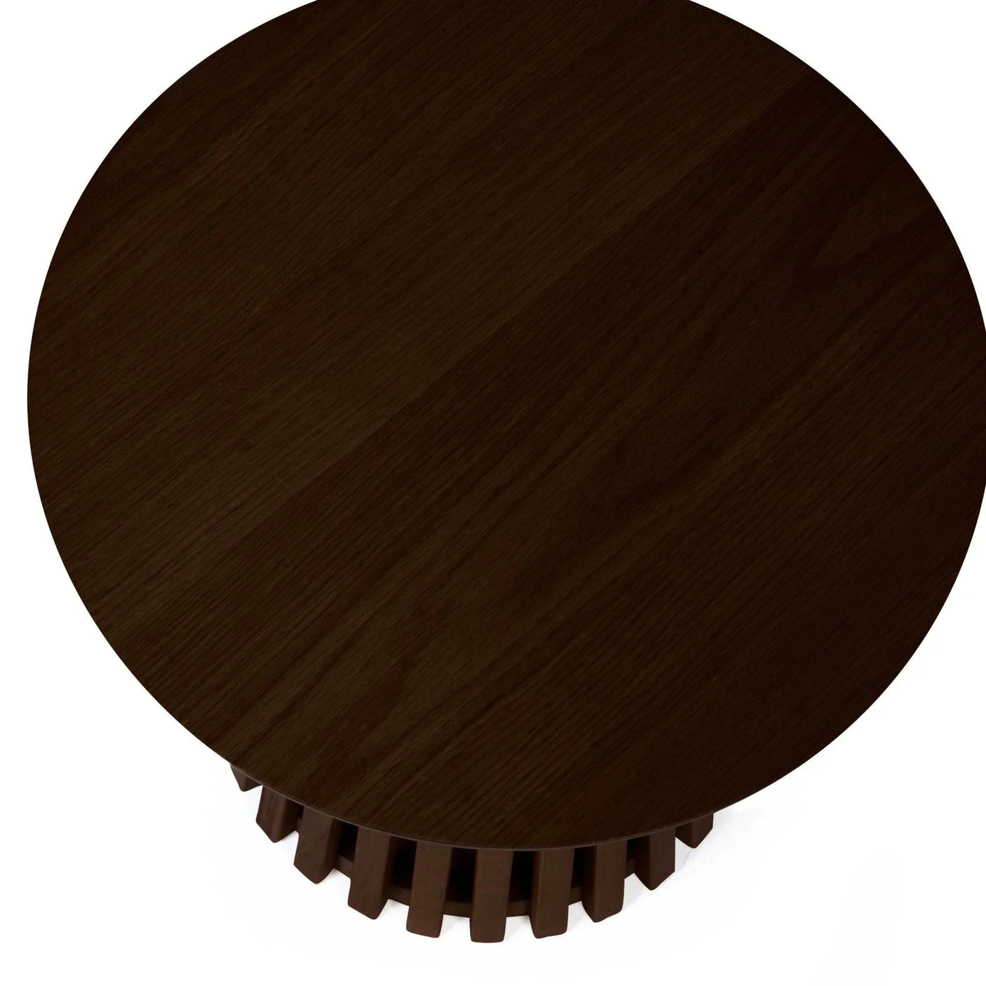 Round dark wood coffee table with grooved base, top view