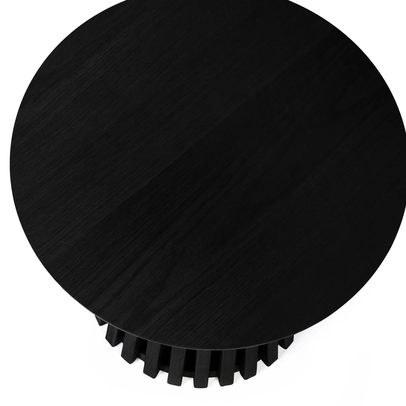 Black round coffee table with fluted wooden base, top view