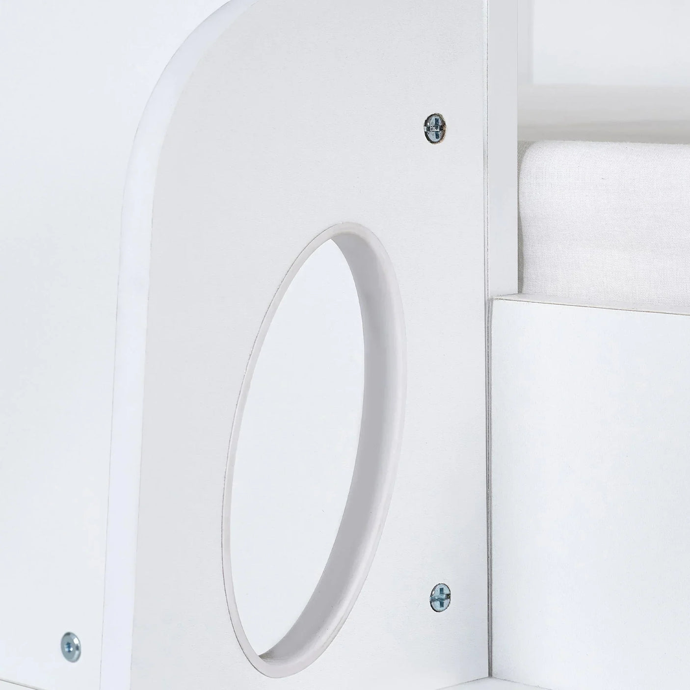 White midsleeper bed frame close-up showing side panel with oval cut-out and screws