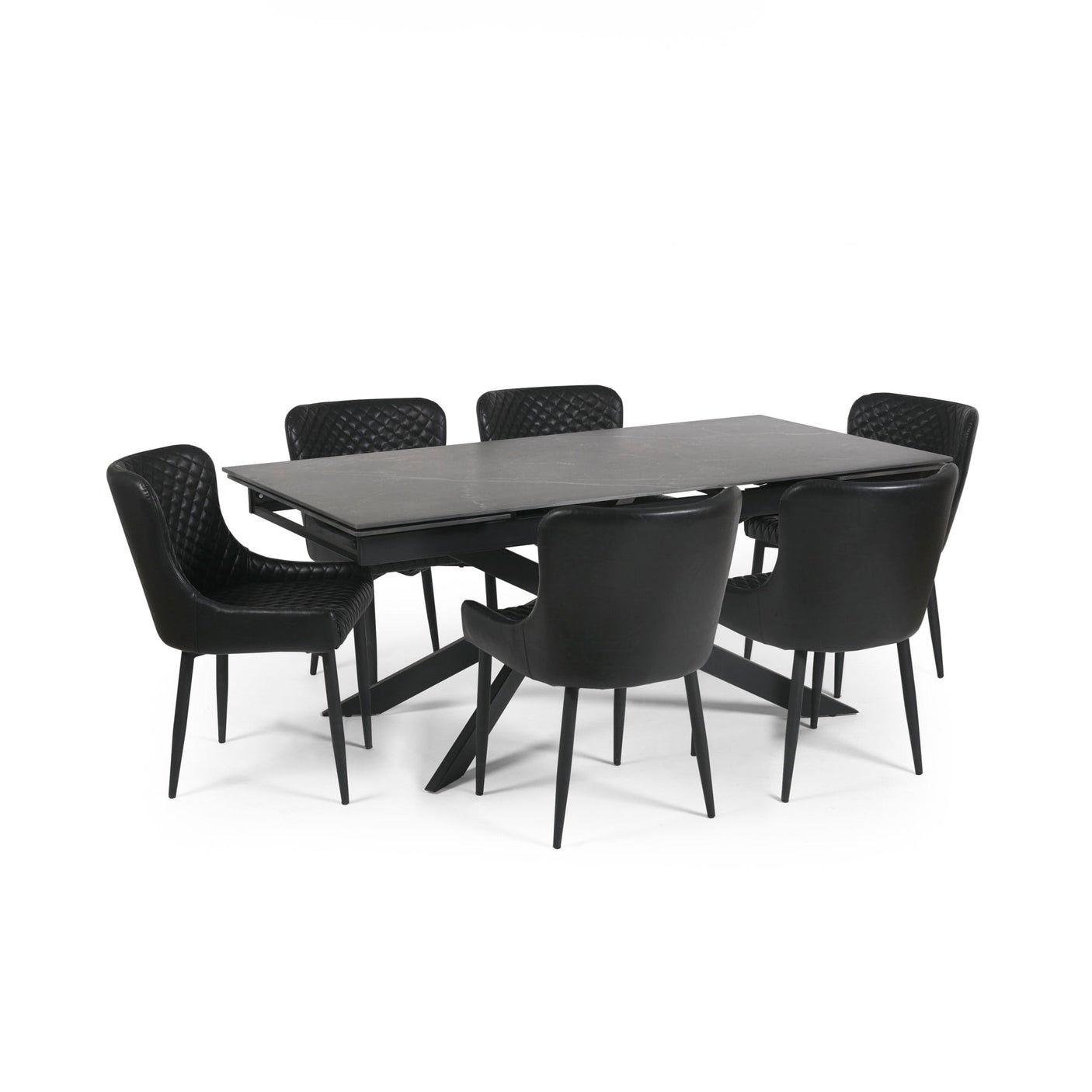 Extended black dining table with six black leather chairs, viewed from an angle on white background.