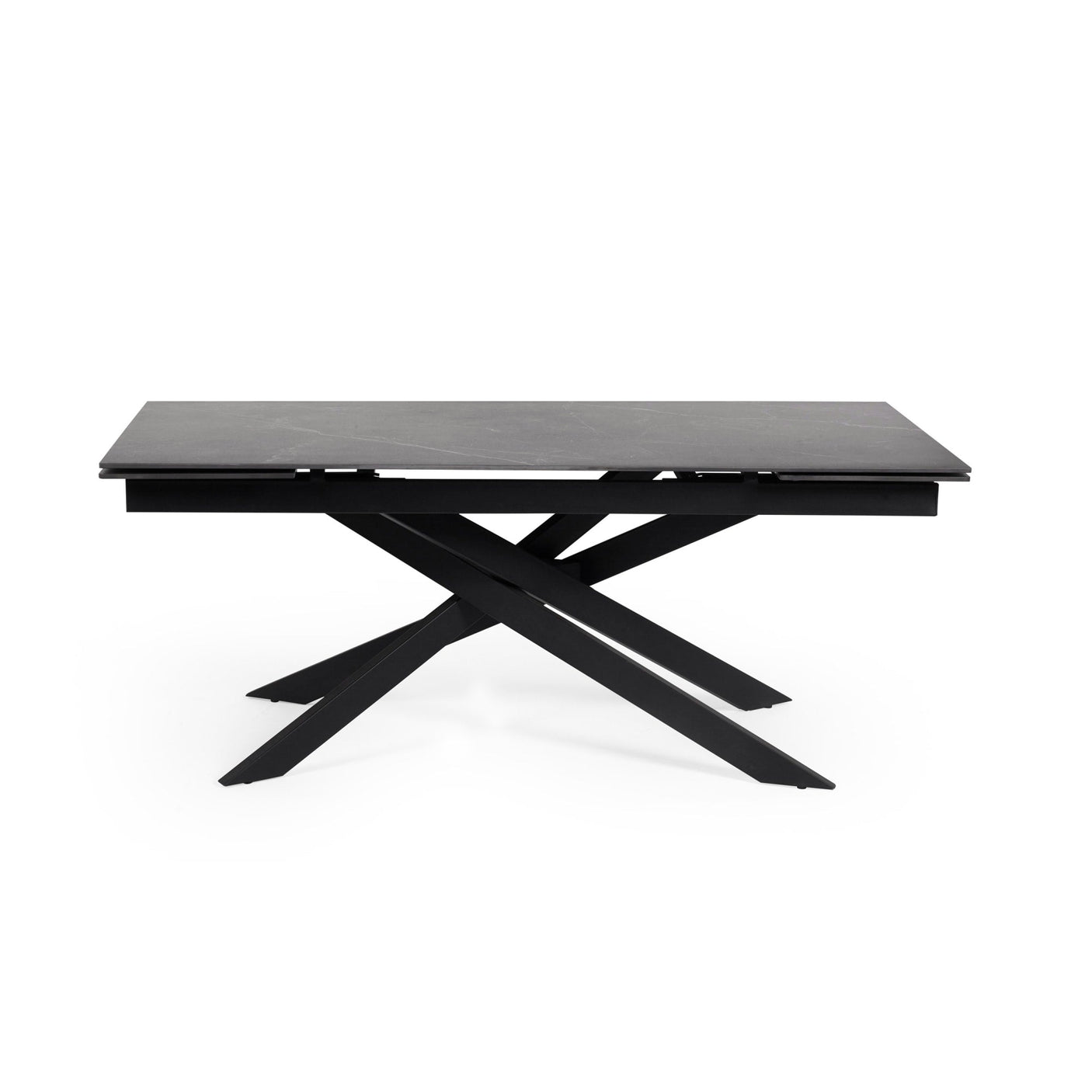 Rectangular dining table with black marble top and black crossed metal legs, side view isolated on white