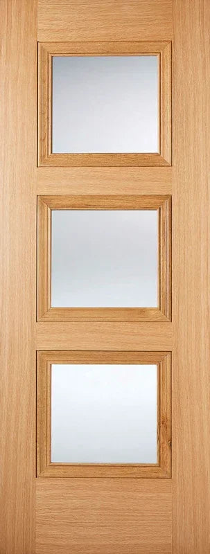 Oak internal door with three square glazed panels and natural wood grain finish
